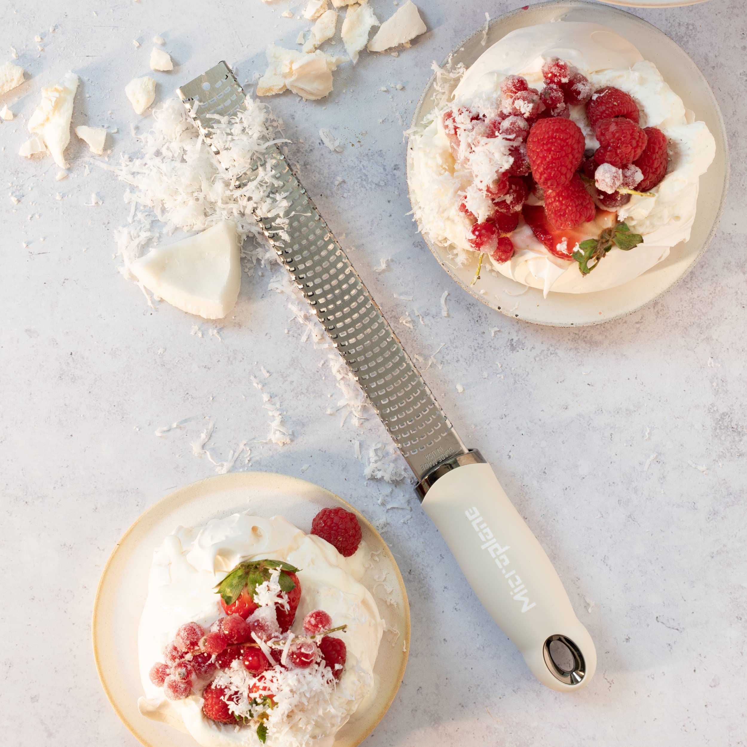 Microplane Zester Grater grates fresh ginger into a smooth aromatic paste.