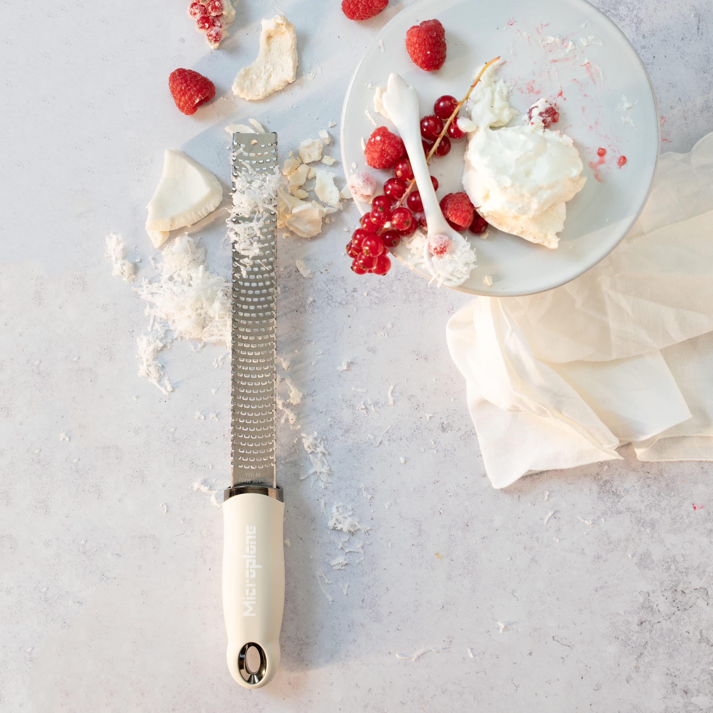 Microplane Zester Grater shaves nutmeg into warm desserts and drinks.