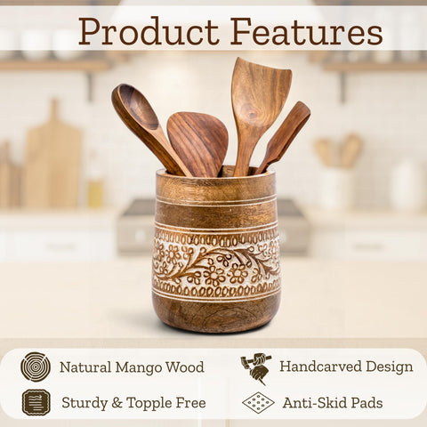 Mie Creations mango wood utensil holder with floral handcarving adds rustic charm.