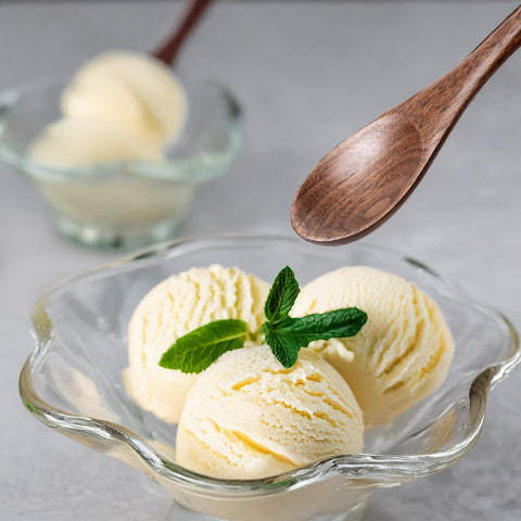 Migaku Home spoons showcase rich wood grain while serving desserts