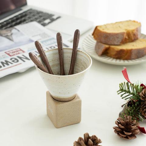 MIGAKU HOME kitchen scene shows natural walnut spoons in use.