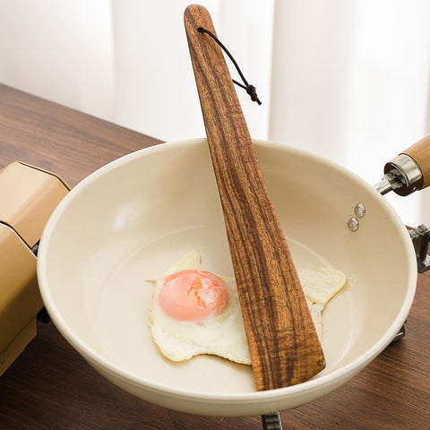 MIGAKU HOME close-up shows warm wood grain and smooth finish