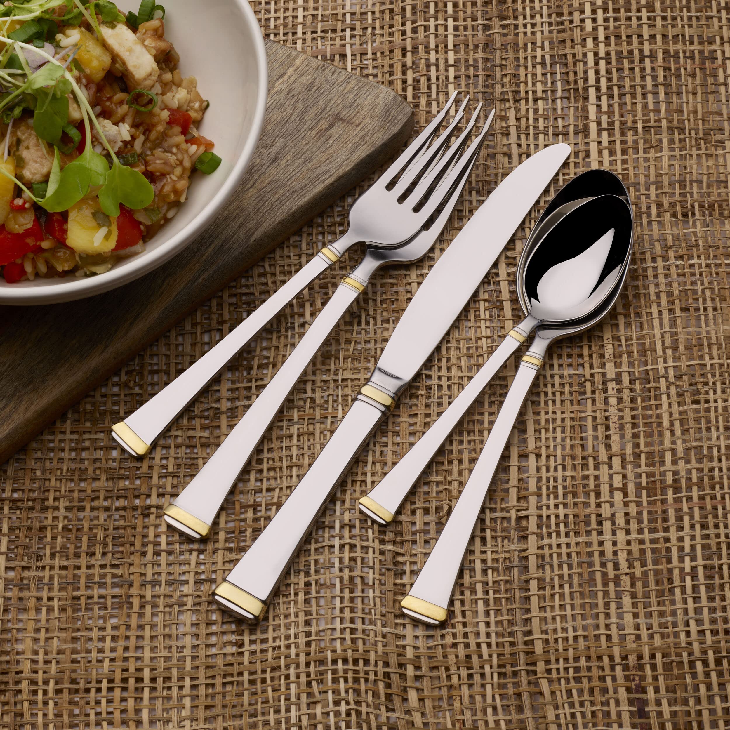 Ergonomic grip shown on Mikasa Gold Accent Harmony flatware.