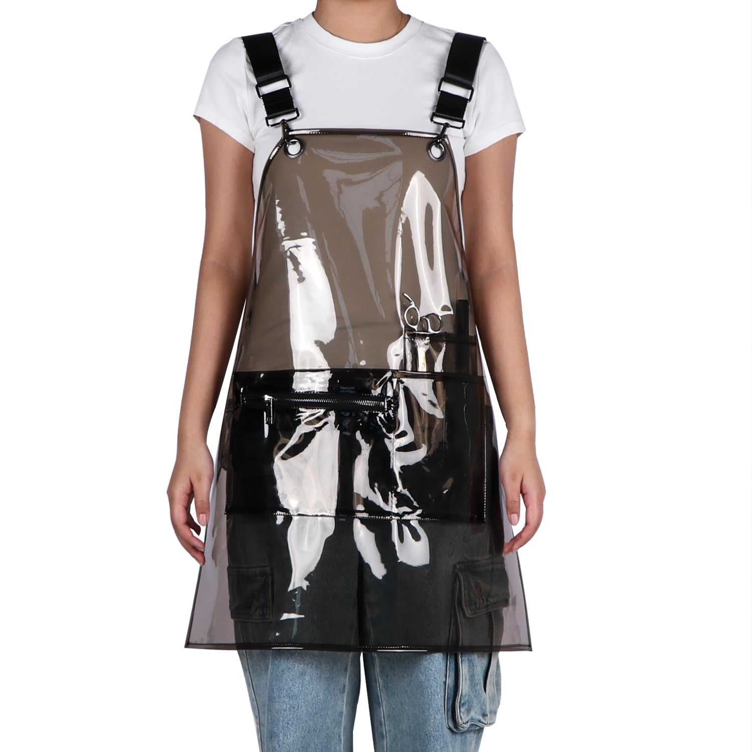 MIKI WELL transparent apron highlighting tool storage while protecting clothing.