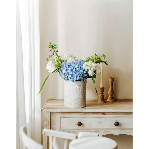 MIKIGEY multi-functional ceramic holder serves as vase or brush container in cozy spaces.