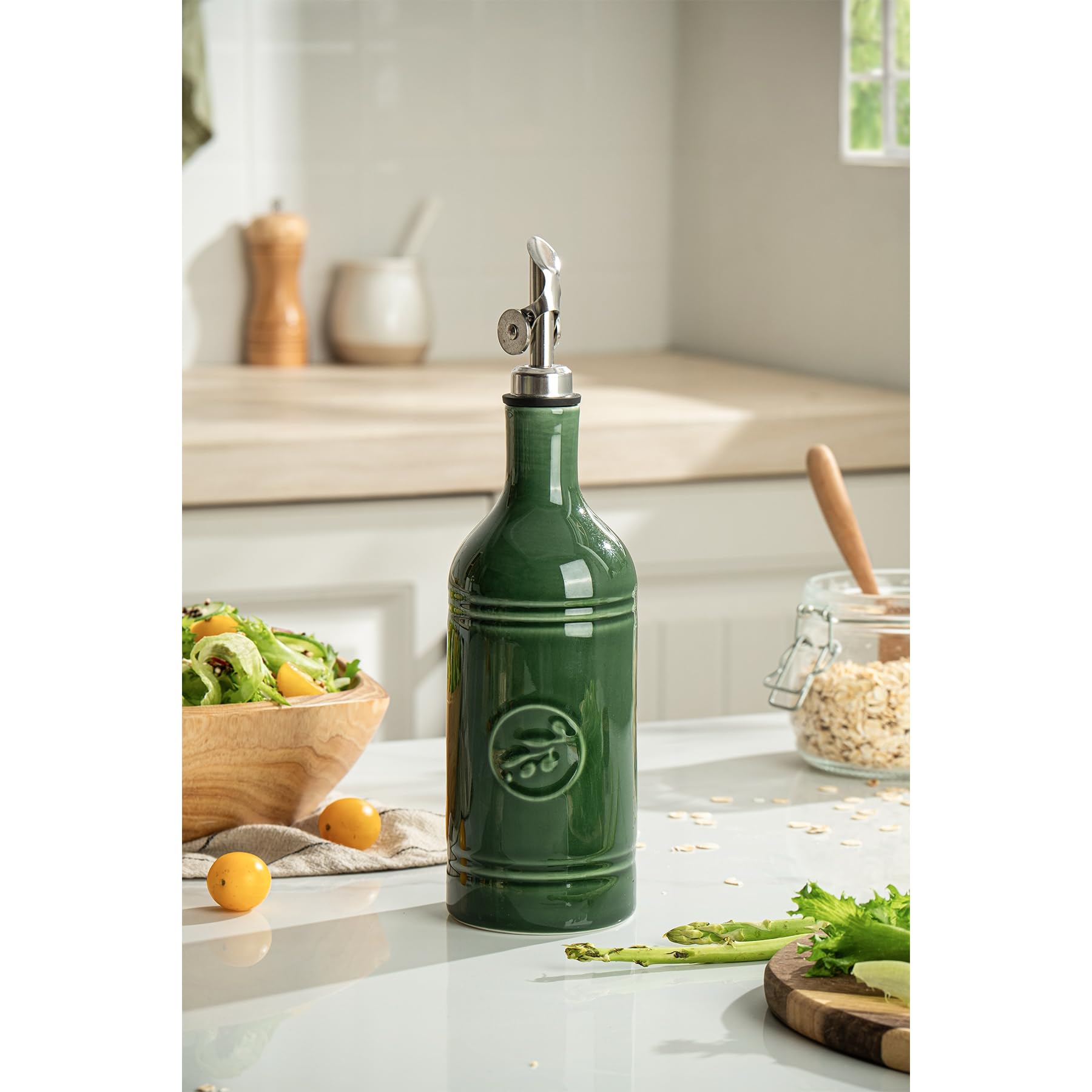 MIKIGEY ceramic olive oil dispenser featuring olive leaf motif in jade green