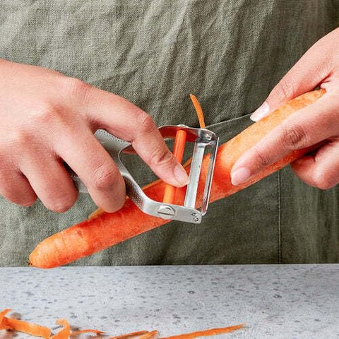 Milk Street Precision Peeler ergonomic handle offers comfortable, versatile grip.