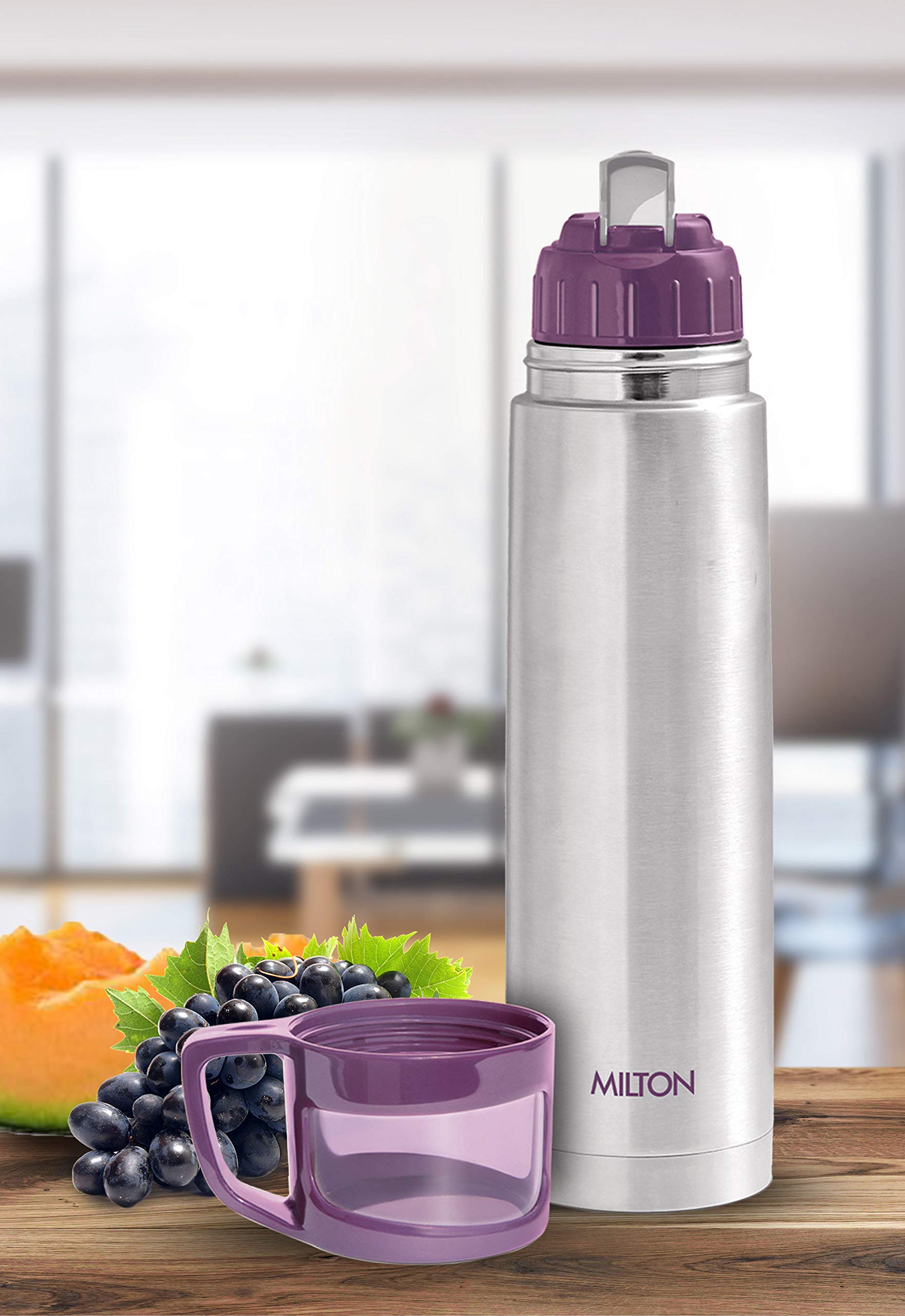 Milton Thermosteel Glassy flip lid shows spill-free drinking on the move.