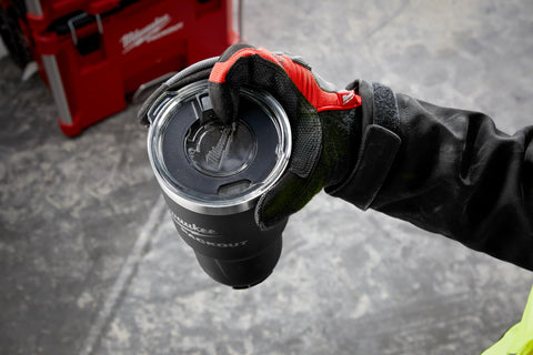 Milwaukee Packout insulated tumbler in use, preserves beverage temperature on the go.