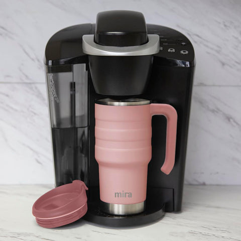 MIRA 20 oz stainless steel travel tumbler with handle for a comfortable grip on commutes.
