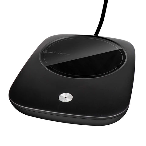 Misby mug warmer on a desk keeps coffee at the ideal temperature for focus and comfort