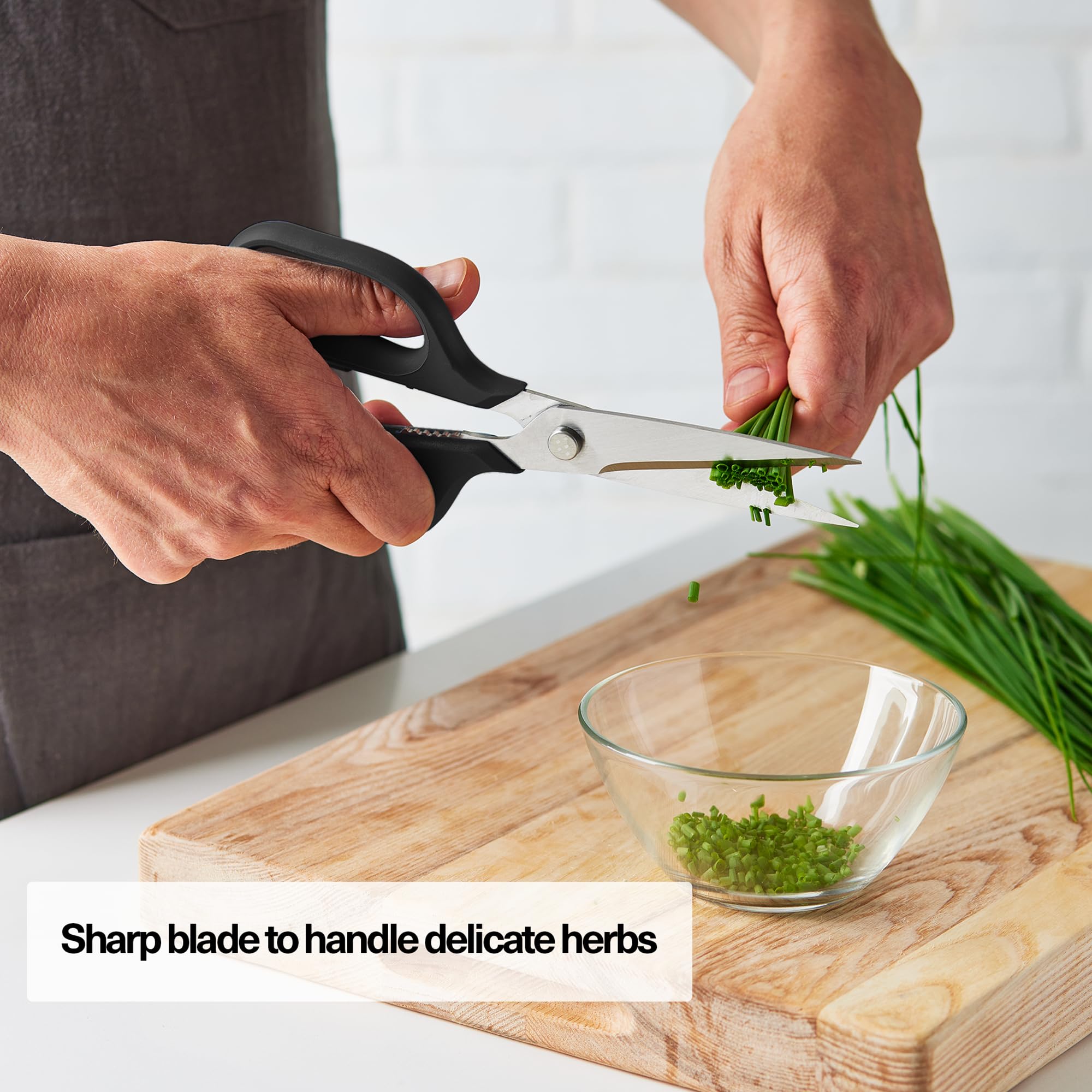 Misen heavy-duty kitchen shears slicing a pizza for quick prep.