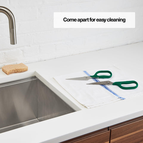 Misen heavy-duty kitchen shears slice pizza evenly for quick portions.