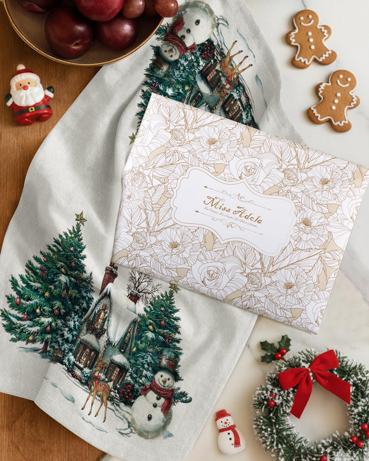 Miss Adola towels are versatile for gift wrapping and baking prep.