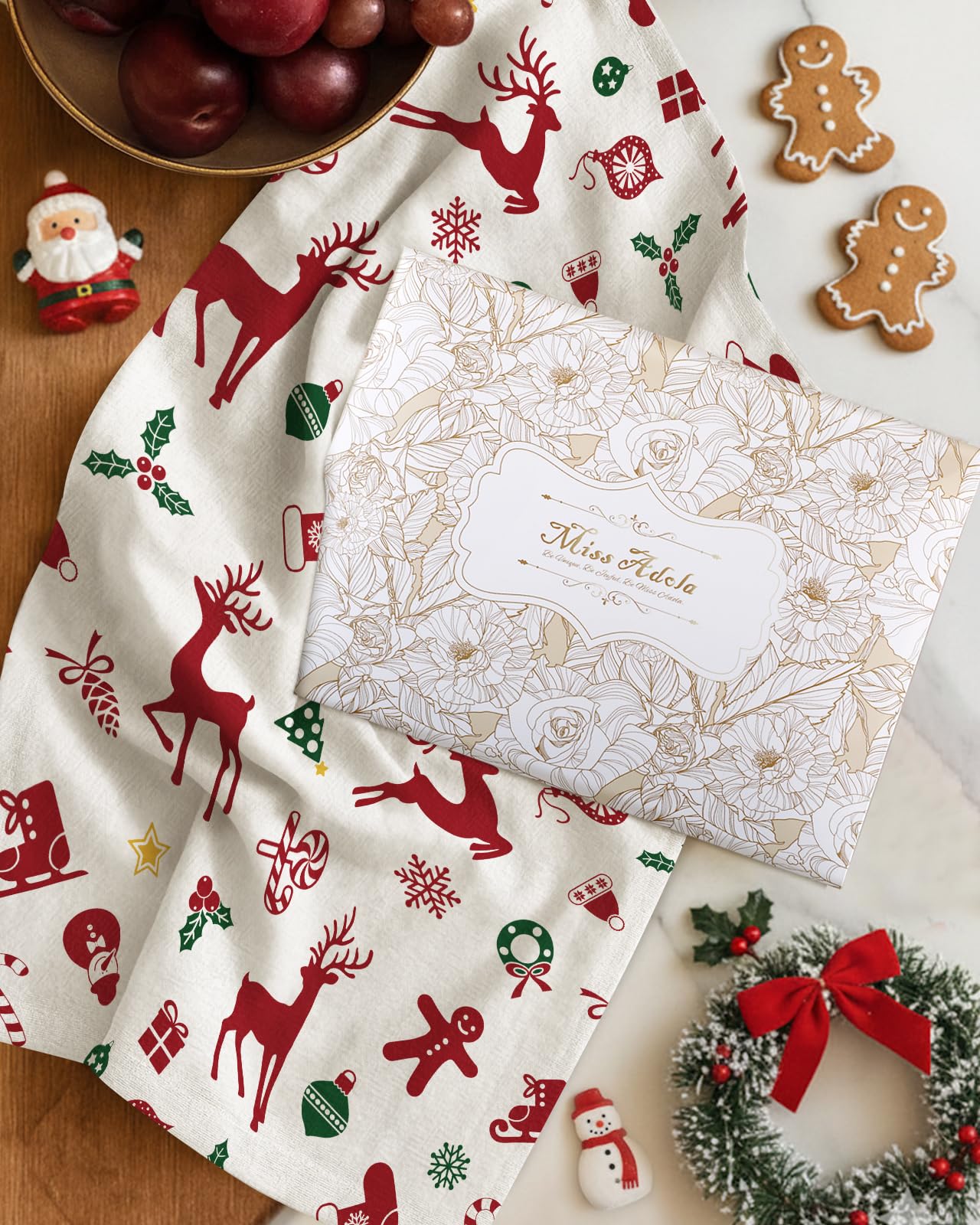 Miss Adola towels serve as heat pads or coasters for seasonal kitchen practicality.
