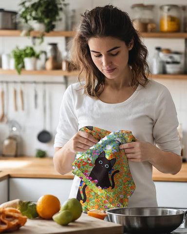 Miss Adola kitchen towels in use demonstrate grease cleaning without lint residue.