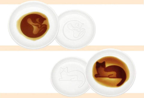 MISS TUTU ceramic dipping bowls highlight cat relief design for stylish sushi service.