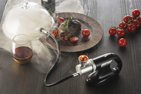 MITBAK portable smoking gun used to infuse meat, cheese, and drinks with subtle smoke.