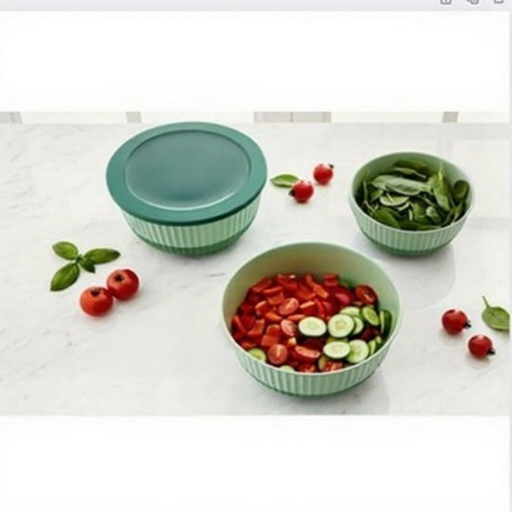 Eight-piece Mixing Bowls with Lids set ideal for meal prep and serving.
