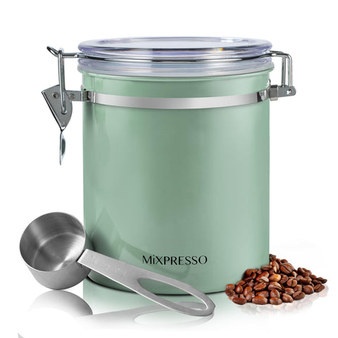 Mixpresso green coffee canister with airtight seal preserving coffee beans freshness.