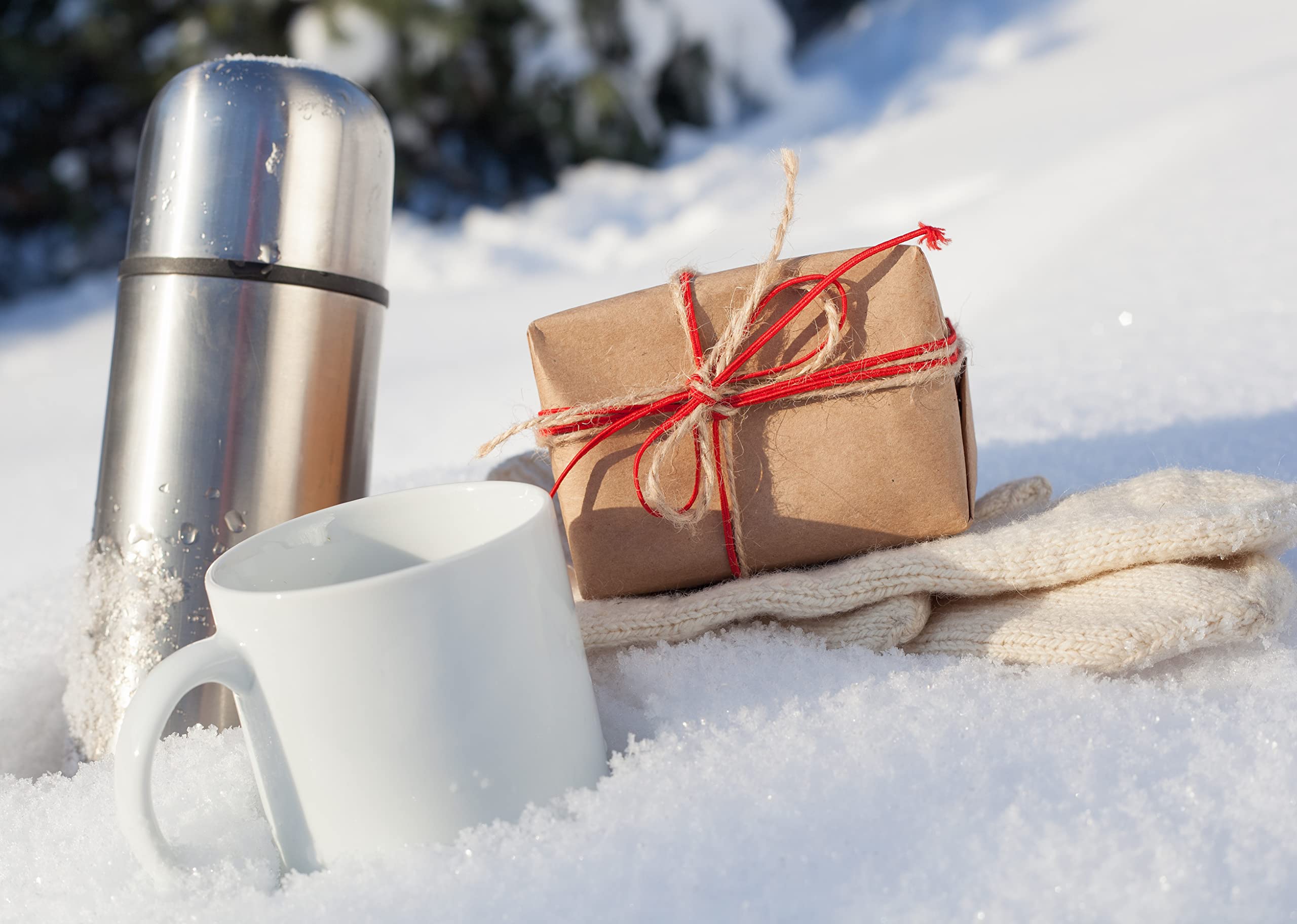 Mixpresso travel mug in cup holder for car-ready portability.