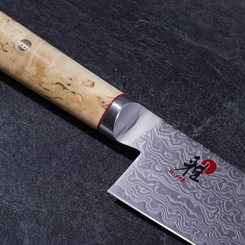 Miyabi Birchwood SG2 Karelian Birch handle close-up emphasizes ergonomic grip.