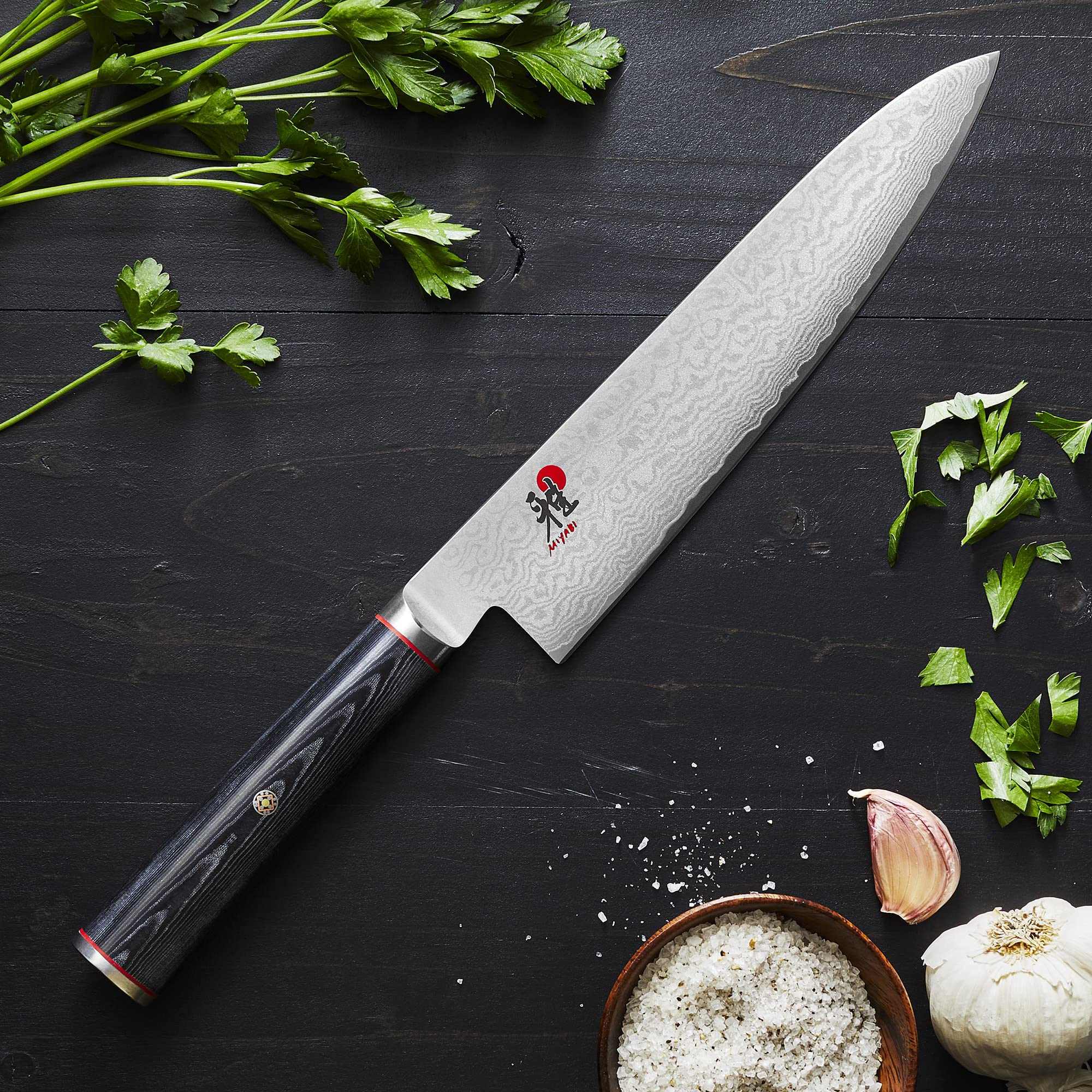 MIYABI Kaizen micarta D-shaped handle offers comfortable grip and moisture resistance.