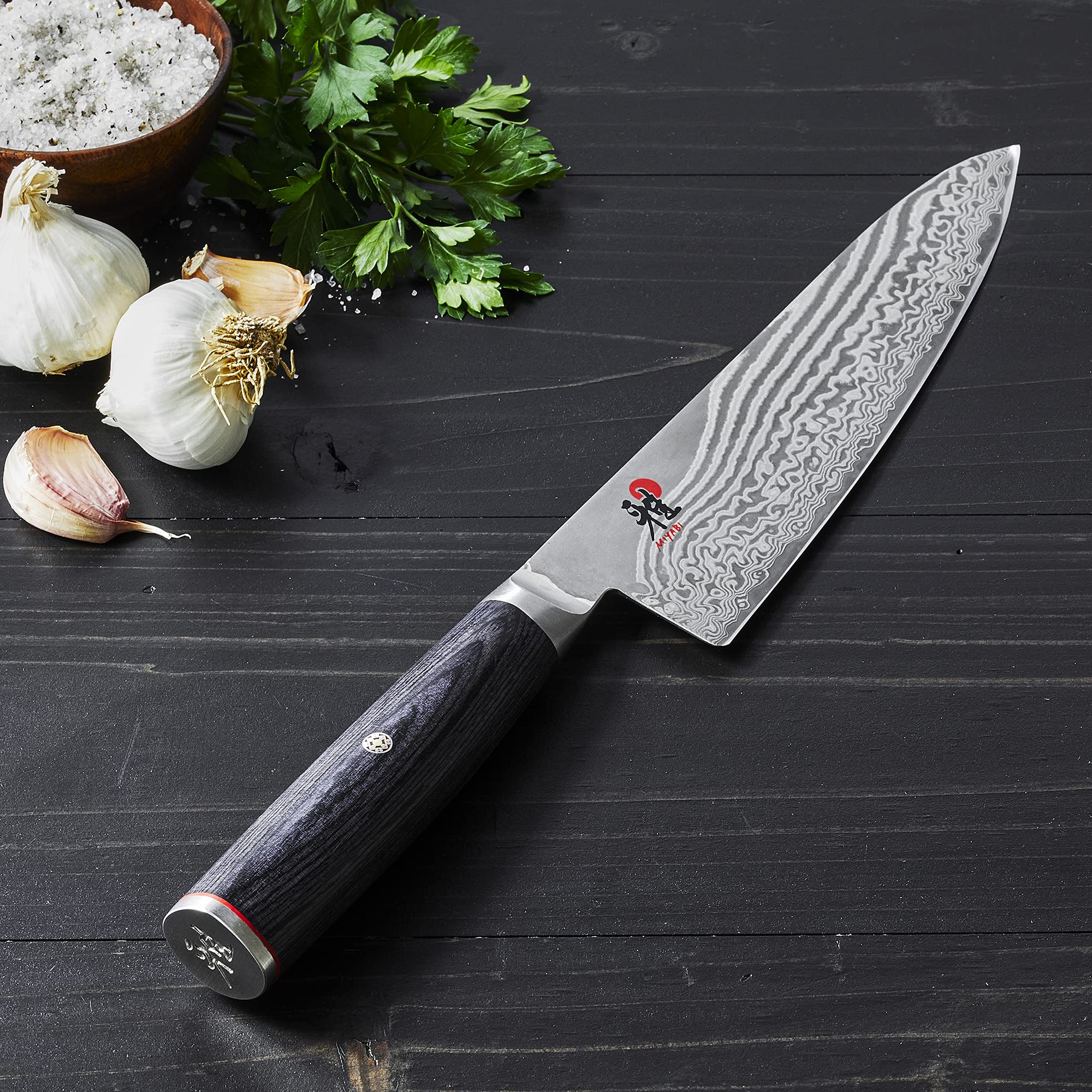 Miyabi Kaizen II D-shaped pakkawood handle provides comfortable grip.