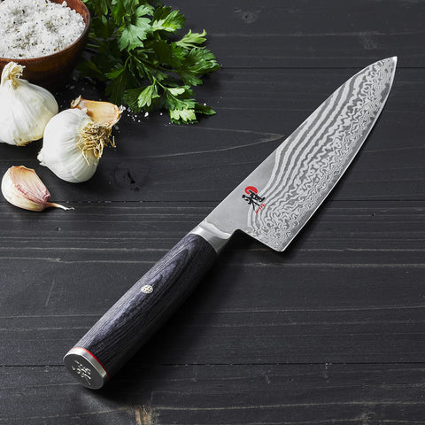 Miyabi Kaizen II D-shaped pakkawood handle provides comfortable grip.