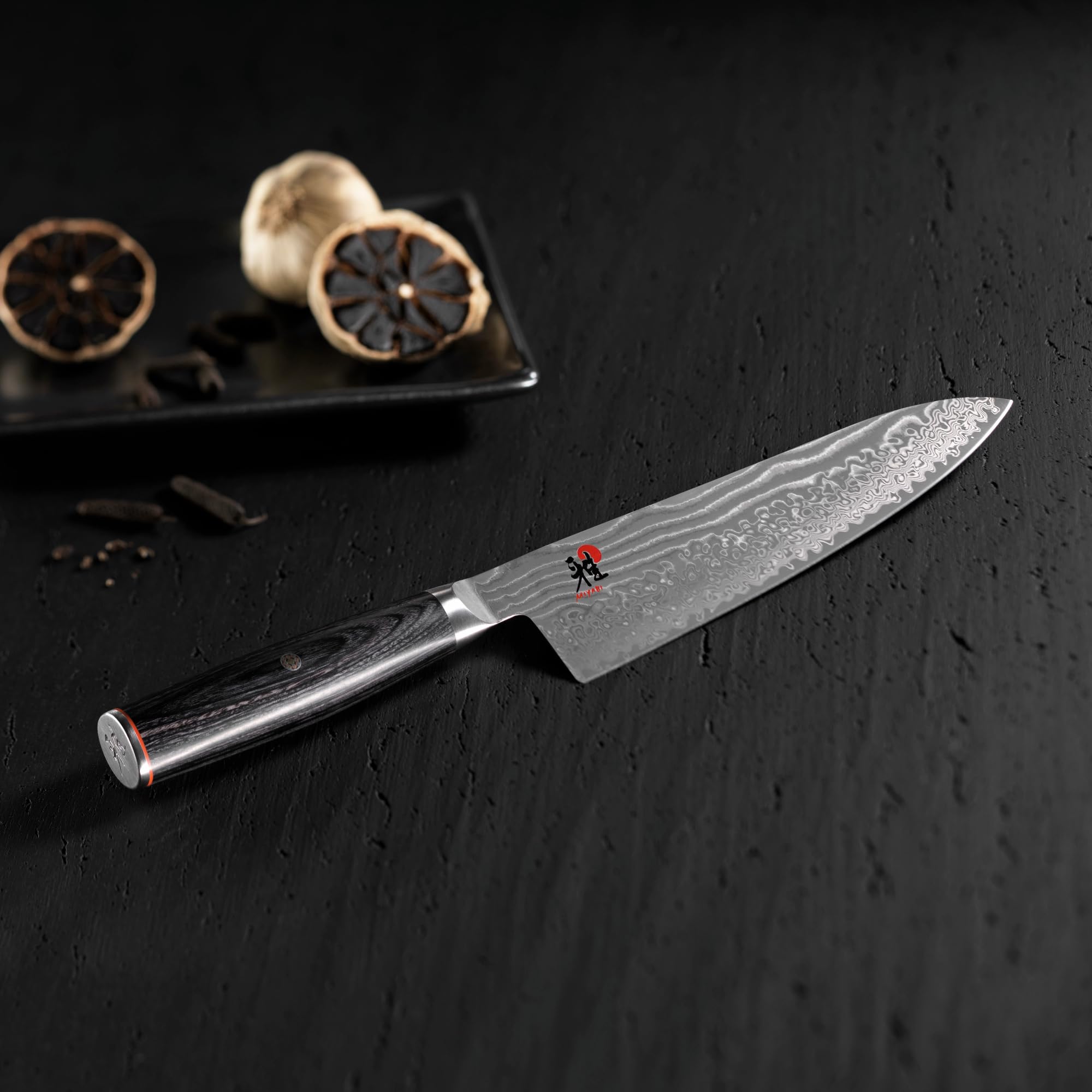 Miyabi Kaizen II blade displays Damascus pattern for elegant presentation.