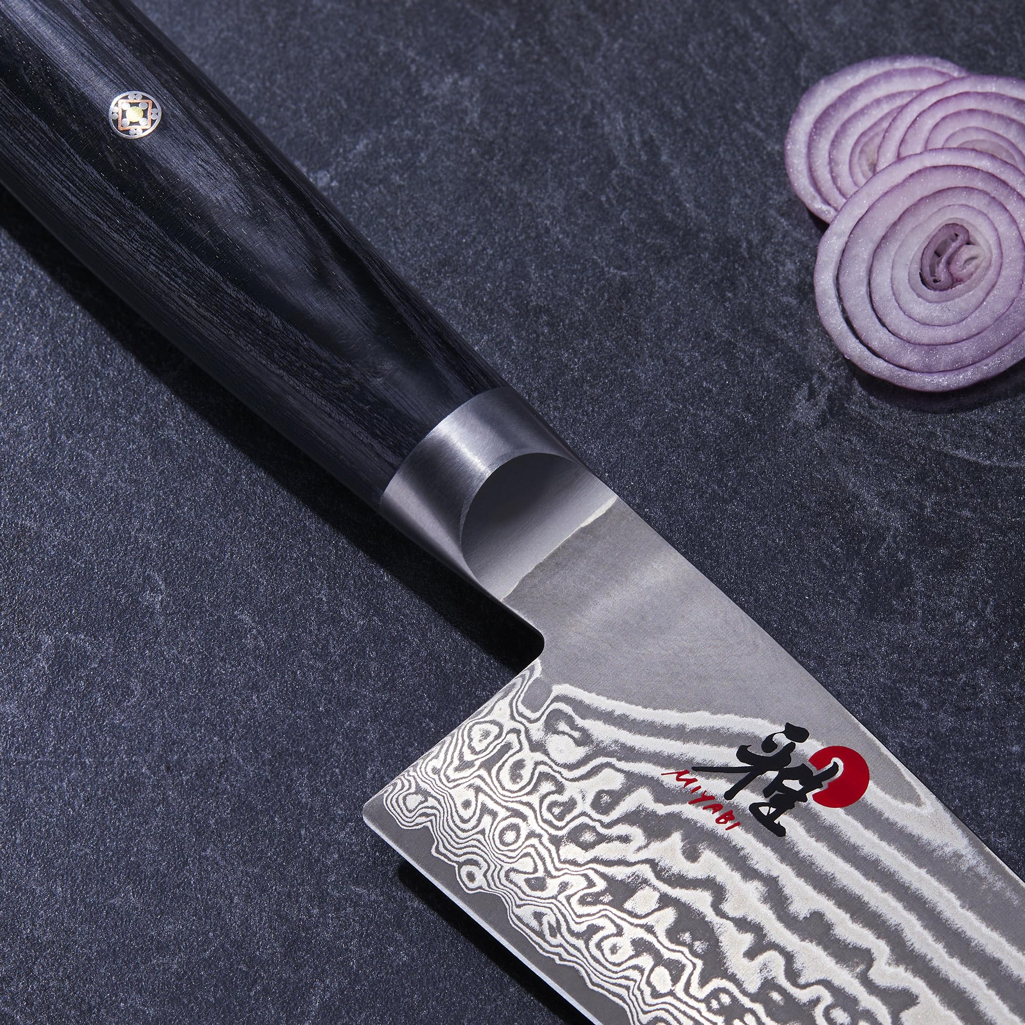 Miyabi Kaizen II thin blade profile enables precise slicing in kitchens.