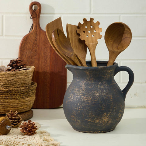 MIYUKI handmade pottery utensil crock showcasing warm kitchen organization