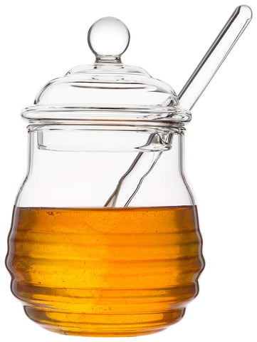 Mkono honey dispenser glass jar with dipper and lid for easy, mess-free pouring.