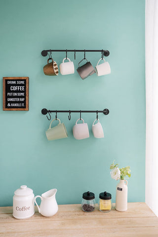 Mkono metal mug rack offers durable rust-resistant storage.