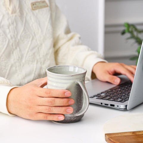 Mkour mug features a comfortable handle for easy grip.