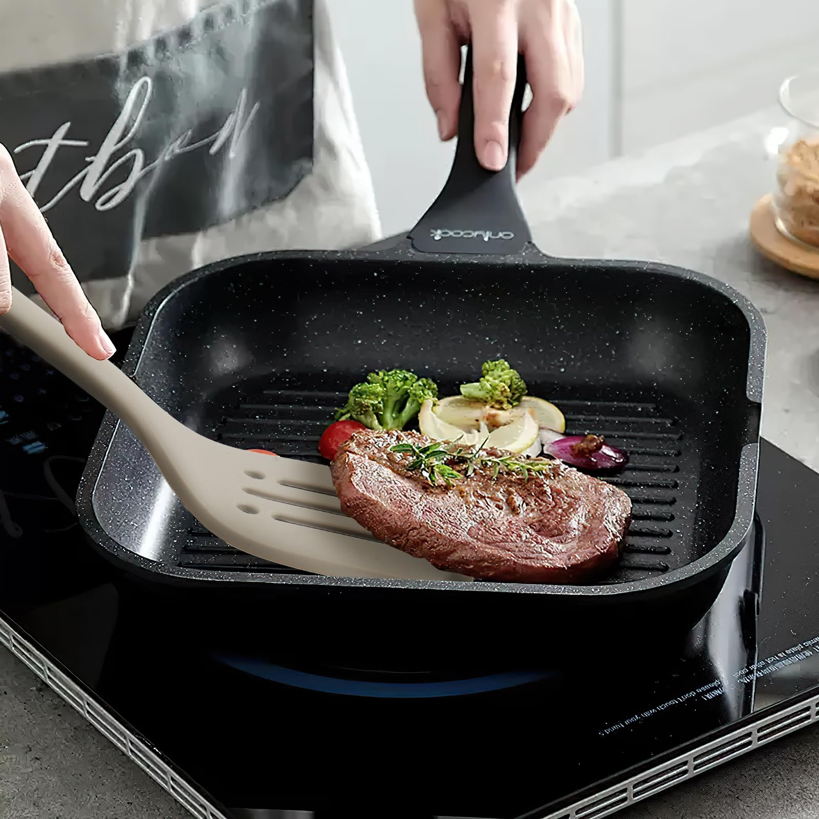 MOACC solid spoon highlights comfortable grip for stirring and serving.