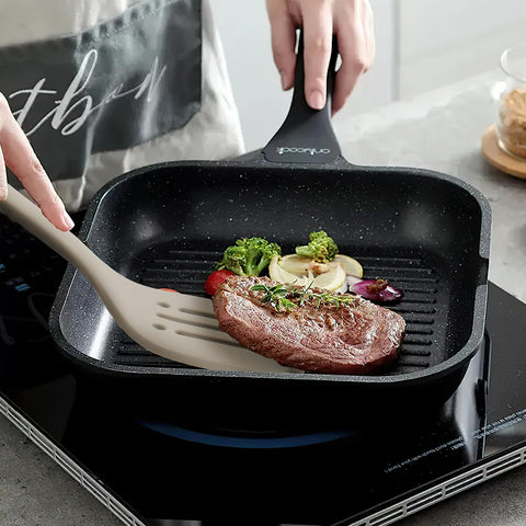 MOACC solid spoon highlights comfortable grip for stirring and serving.