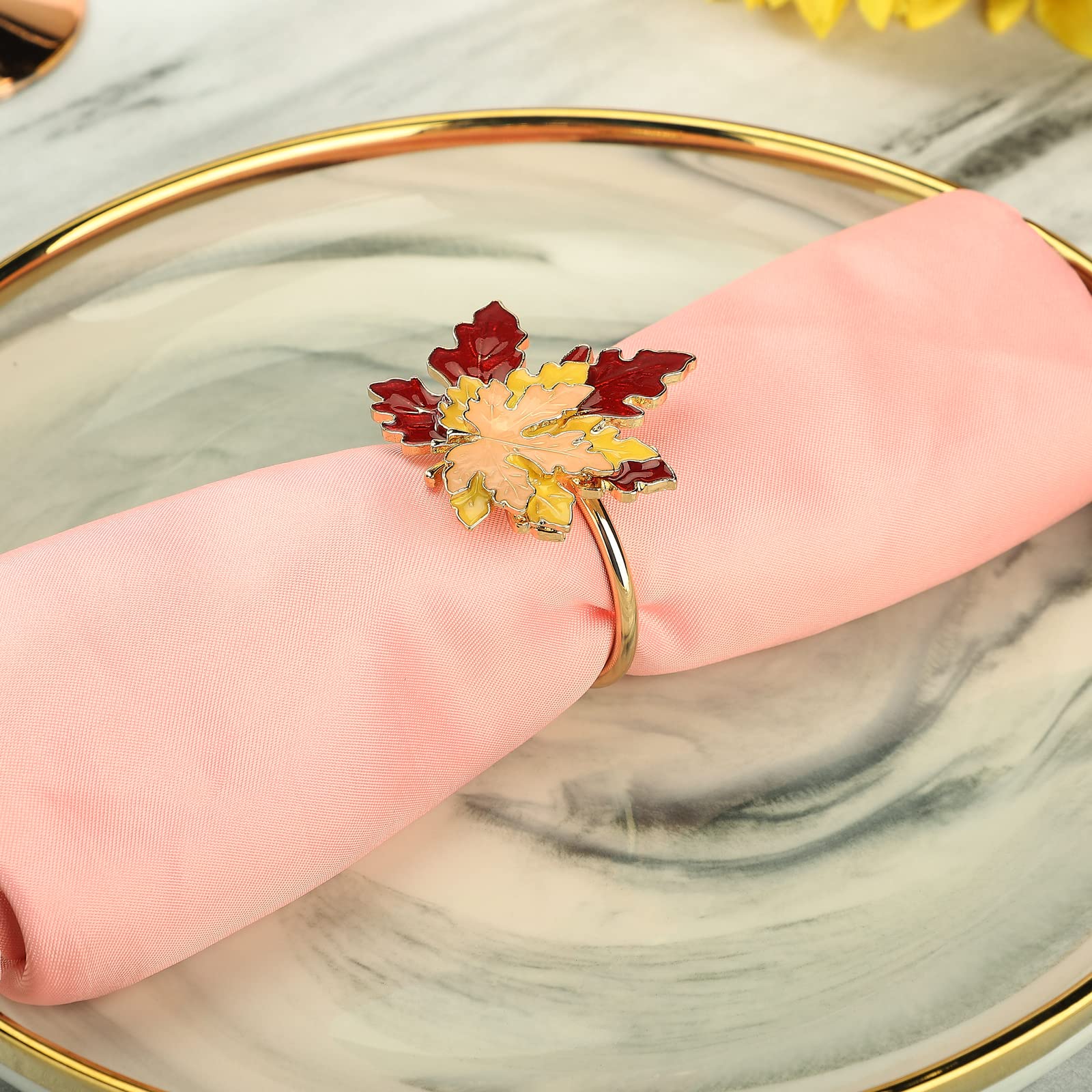 Mokylor maple leaves napkin ring on holiday table creates festive centerpiece.