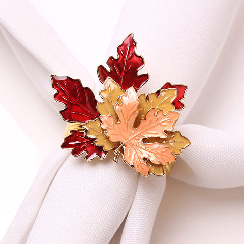Mokylor napkin ring metal finish shines under warm light.