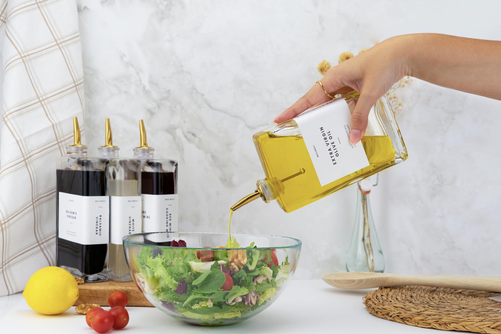 Molimoli versatile dispensers usage captures multi-liquid practicality from oil to vinegar.
