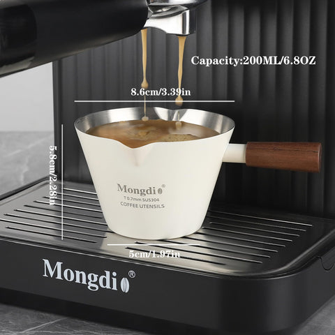 Mongdio espresso measuring cup with walnut wooden handle for a cool, comfortable grip.
