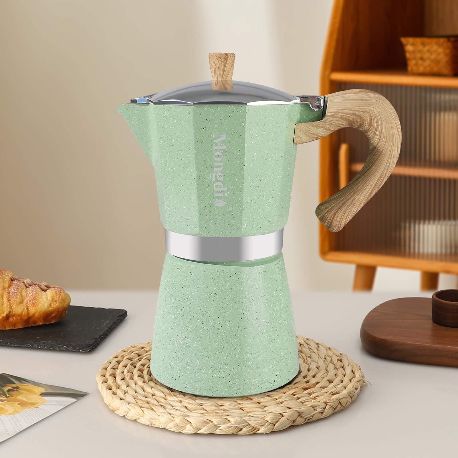 Green Mongdio moka pot in stylish home setup.