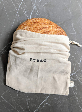 Montecito Home bread storage setup shows reusable linen bag system for daily baking.