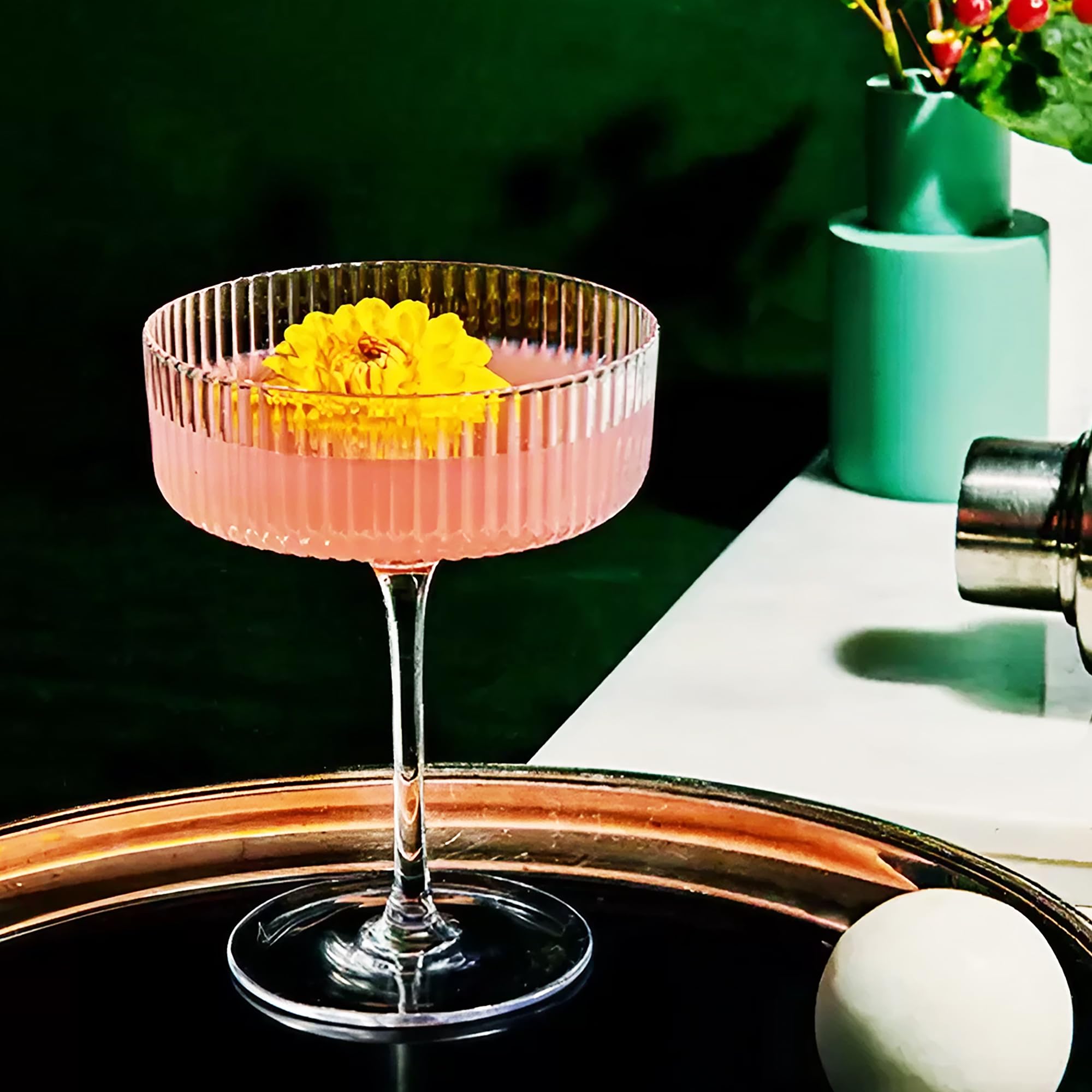 Montex ribbed martini glasses showcase shimmering color with vintage charm.