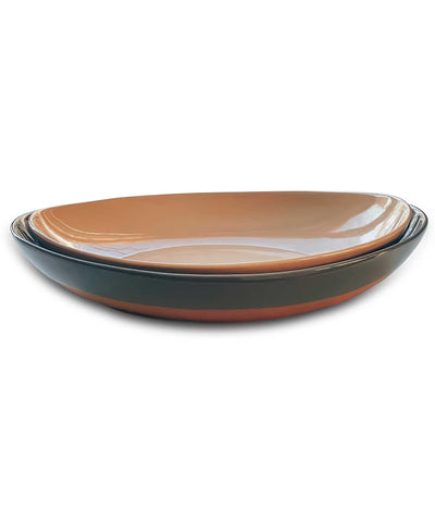 MORA ceramic large serving bowls on table, durable oval platters for entertaining