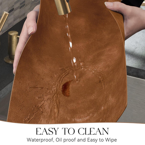MOSAYT placemat being wiped clean to demonstrate waterproof, easy maintenance.