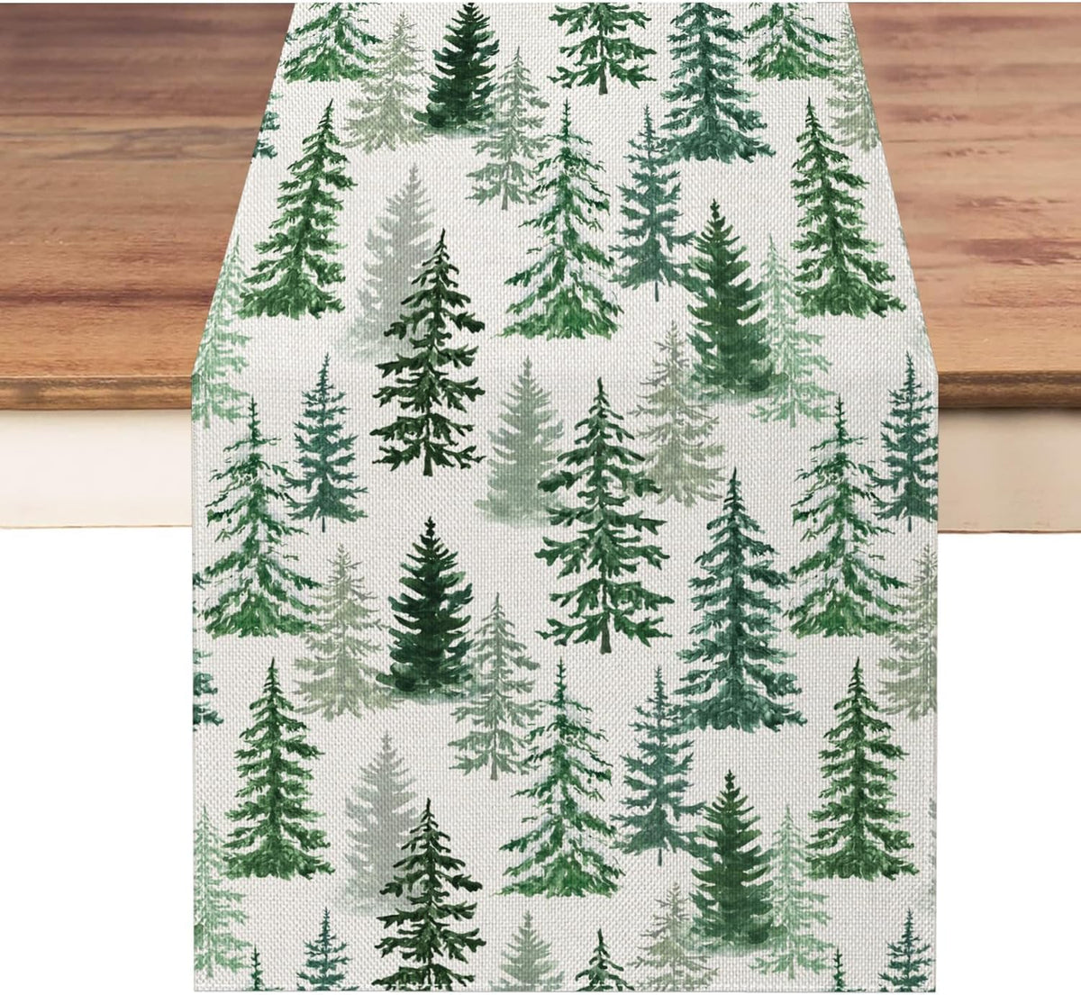 Moutina Christmas table runner 13x90 with green pine trees for festive dining.