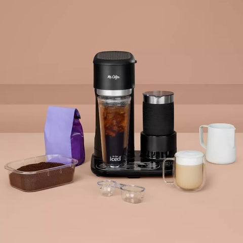 Mr. Coffee tumbler, black with lid, keeps beverages handy on the go.