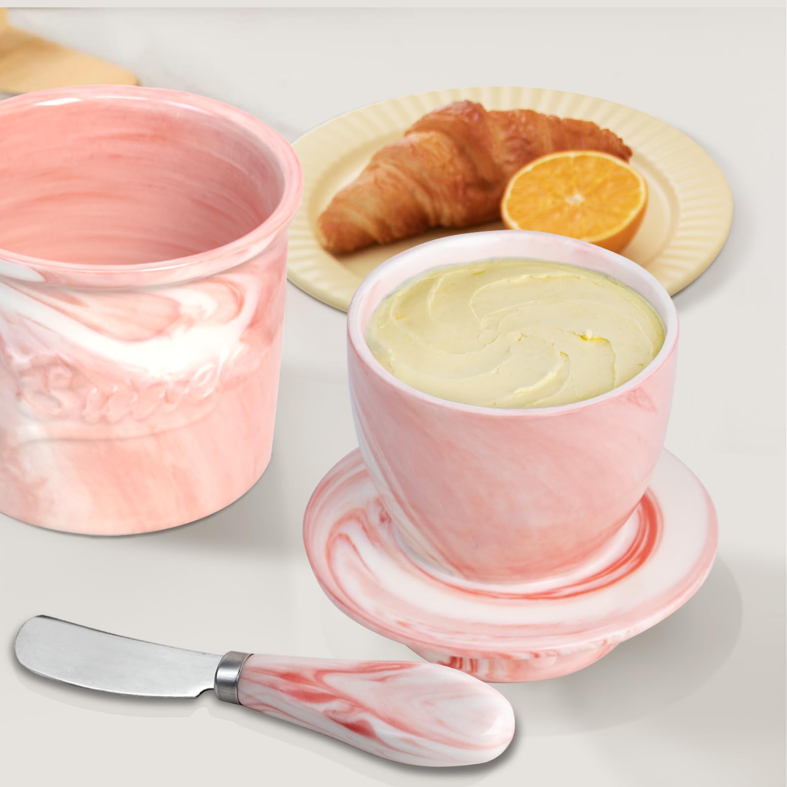 MSJGA marble pink butter knife complements the crock on the countertop