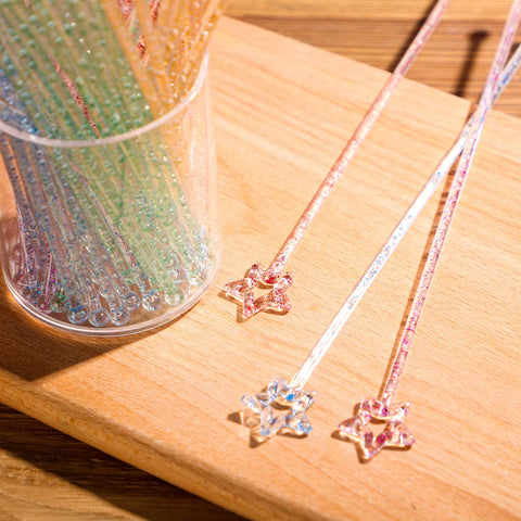 Mudder star-top swizzles help keep garnishes in place